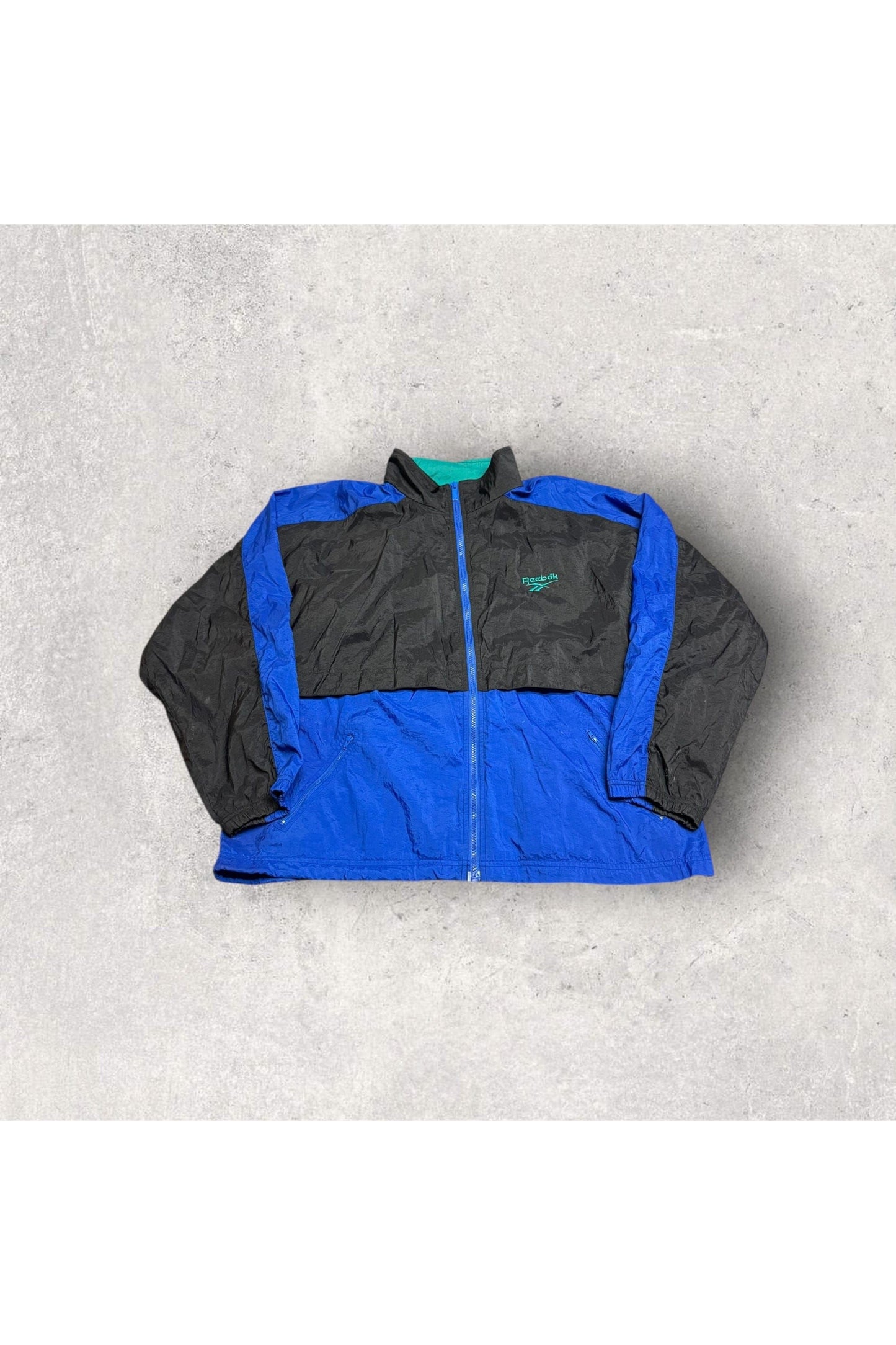 Vintage 90s Reebok Full Zip Windbreaker w/ Tuckaway Hood- XL